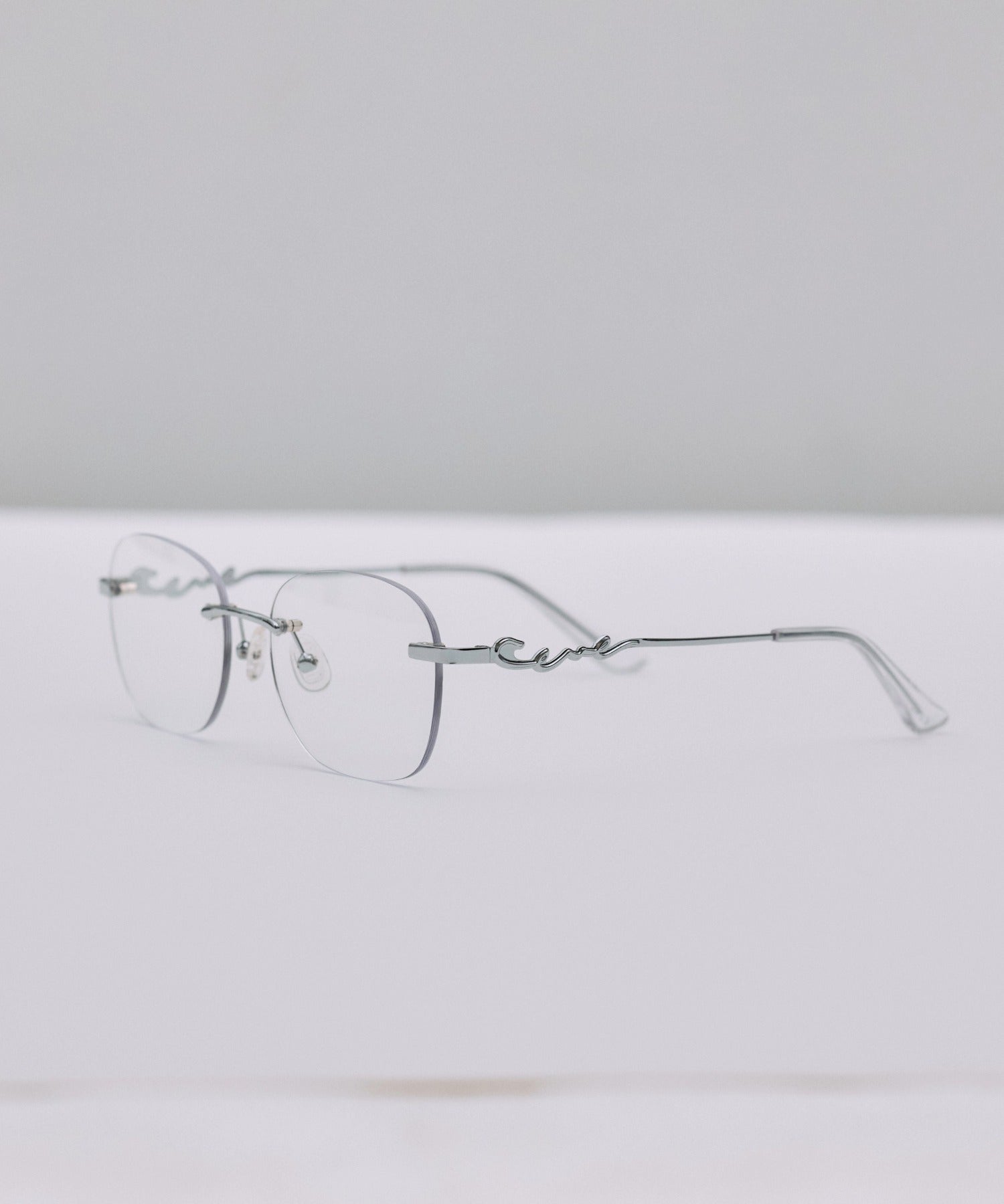 [クリア]テンプルロゴリムレスアイウェア