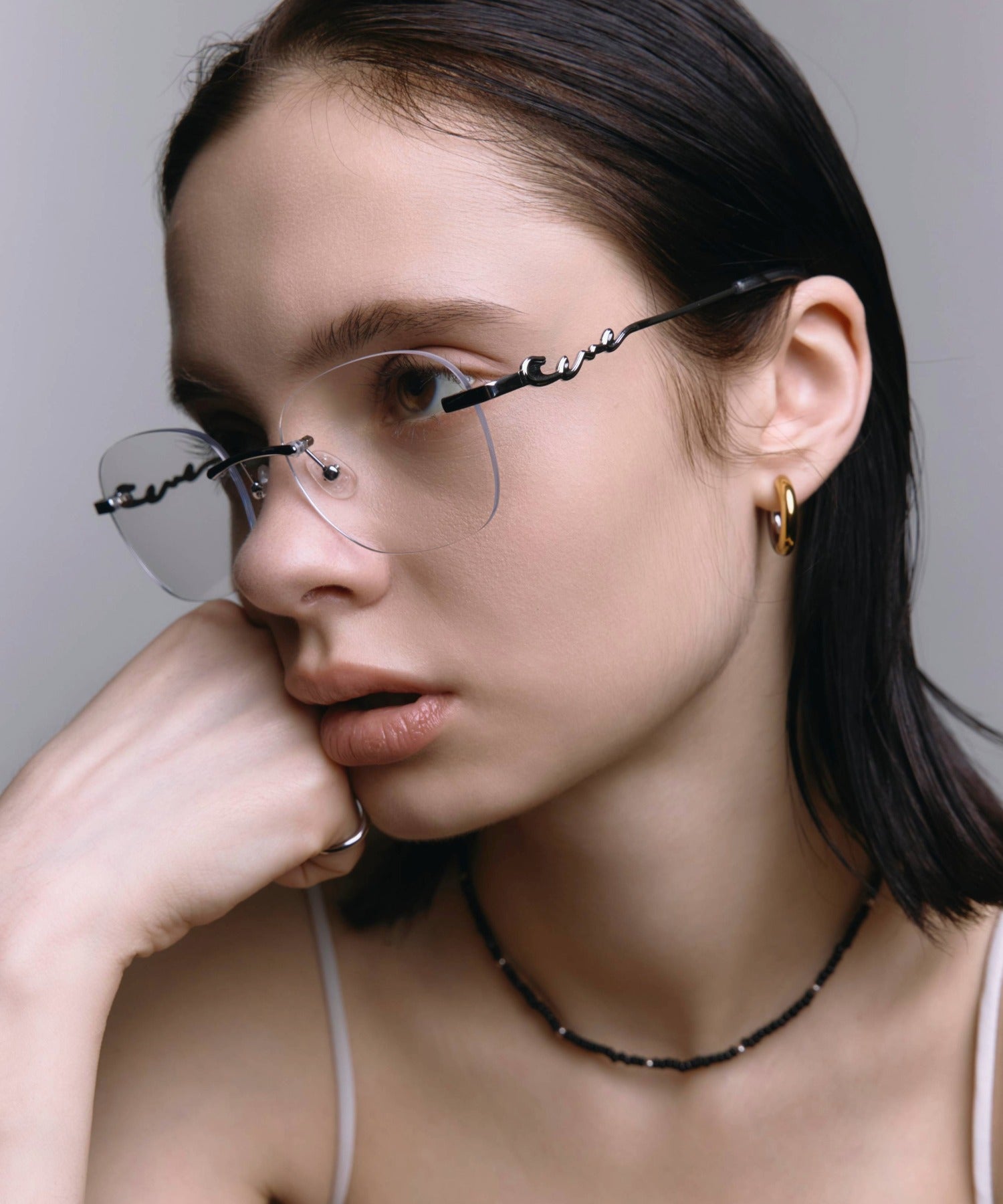 [クリア]テンプルロゴリムレスアイウェア