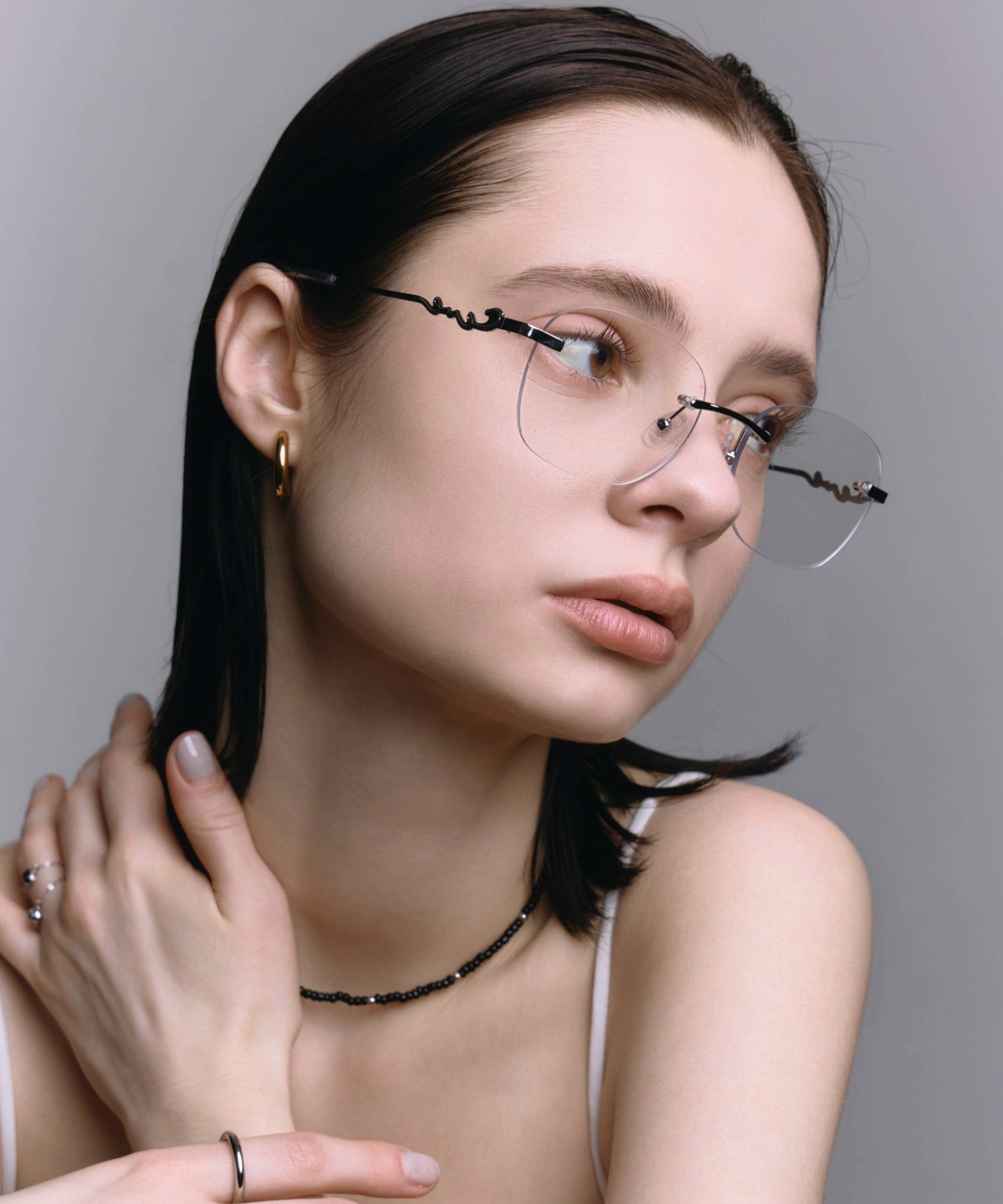 [クリア]テンプルロゴリムレスアイウェア