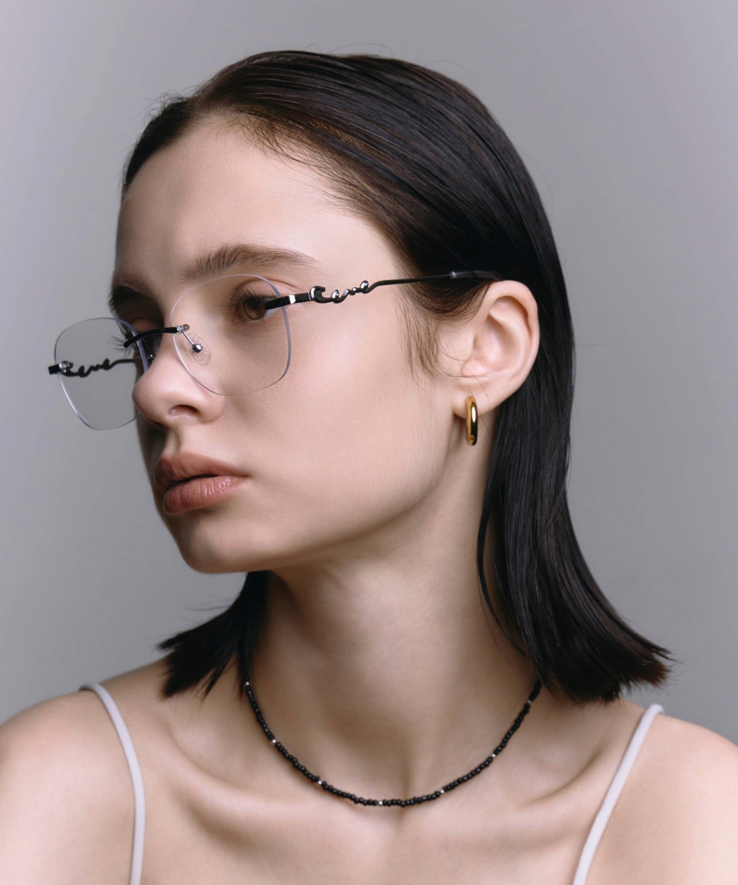 [クリア]テンプルロゴリムレスアイウェア