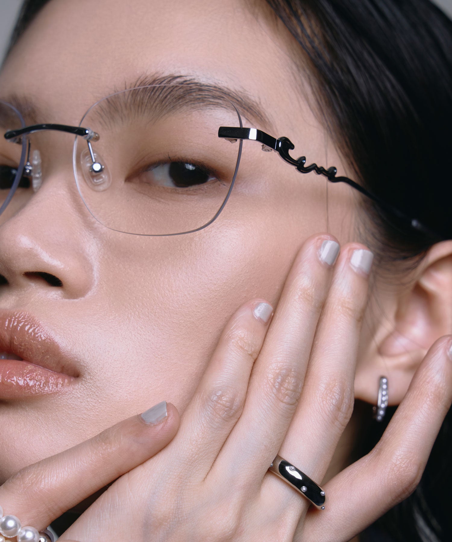 [クリア]テンプルロゴリムレスアイウェア